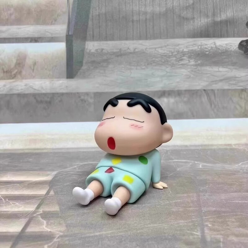 クレヨンしんちゃんの携帯電話のスタンドのファッションは小さい置物のアイデアのデスクトップの置物の怠け者の携帯電話のスタンドのフィギュアの公仔を遊びます。|undefined