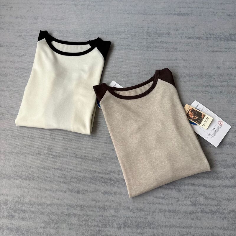 Stylish color blocking creates a beautiful and airy look! This women’s long-sleeved T-shirt features a round neck, a blend of Lyocell and wool for softness and comfort, and a stylish raglan sleeve design Stylish color blocking creates a beautiful and airy look! This women’s long-sleeved T-shirt features a round neck, a blend of Lyocell and wool for softness and comfort, and a stylish raglan sleeve design