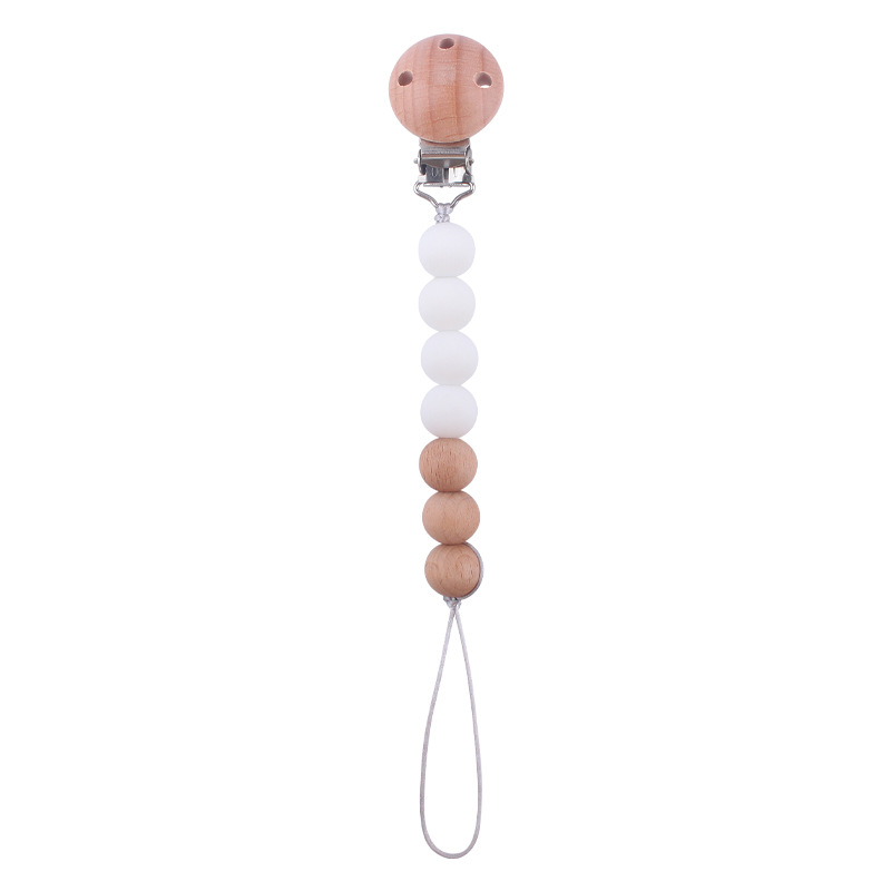 Productos para bebés y niños pequeños agujeros redondos de abóbulo cadena de chupeta para calmar al bebé Zheng Zheng