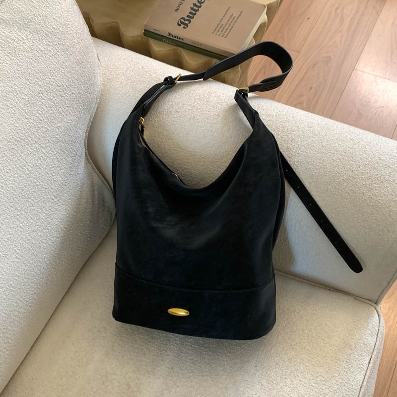 Coreano relajado sensación de colapsar bolso de cubo de seda bolso de mujer 2025 nuevo retro bolso de hombro bolso de viaje