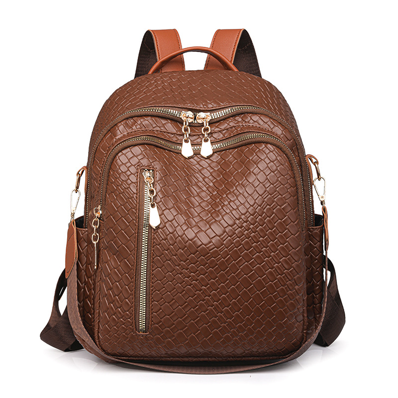 Fábrica al por mayor 2024 nueva mochila de cuero suave para mujer coreana Mochila de viaje al aire libre multifuncional de doble uso de moda