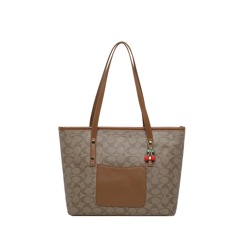 2026 nuevo bolso de mujer de gran capacidad de transporte de hombro bolso de moda versátil bolso de moda bolso de moda colgante de cereza bolso