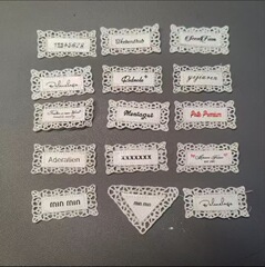 古典的な蝶結びの布はガードルを貼ってマジックを貼って服のdiyのパッチの装飾の材料の工場の卸売りを貼ります。