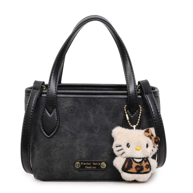 Corea del Sur super caliente retro bolso de mano de estilo extranjero para mujeres 2025 nueva moda simple hombro mochila bolso de cubo de moda