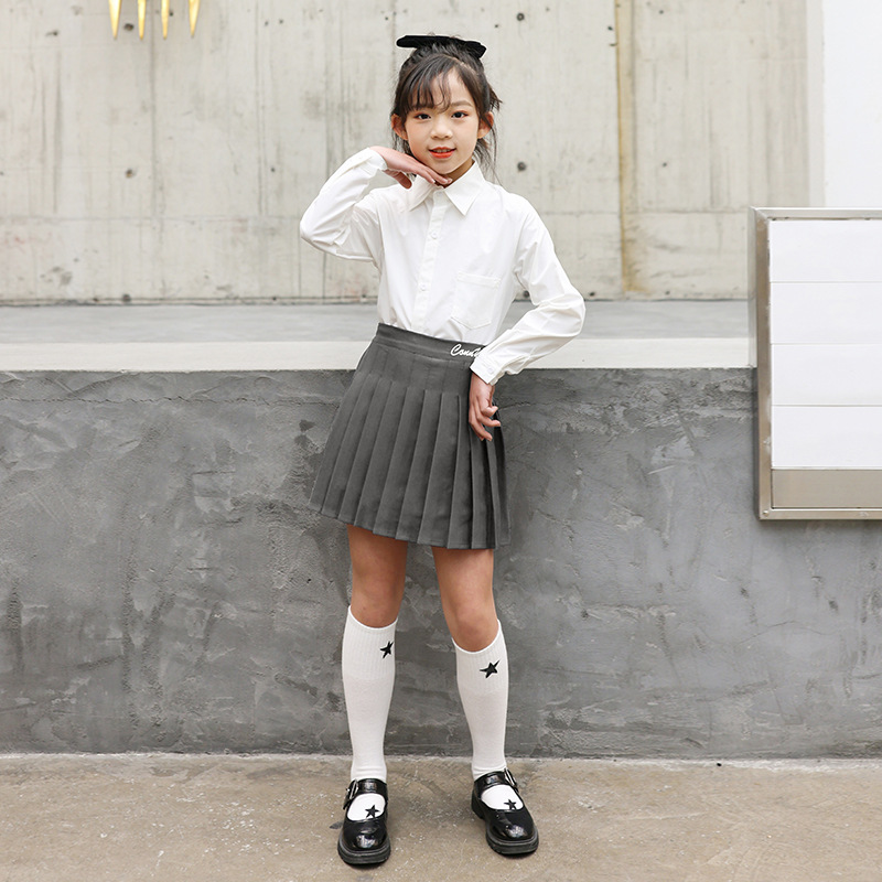 Long-sleeve, colored mini-skirt, bow tie