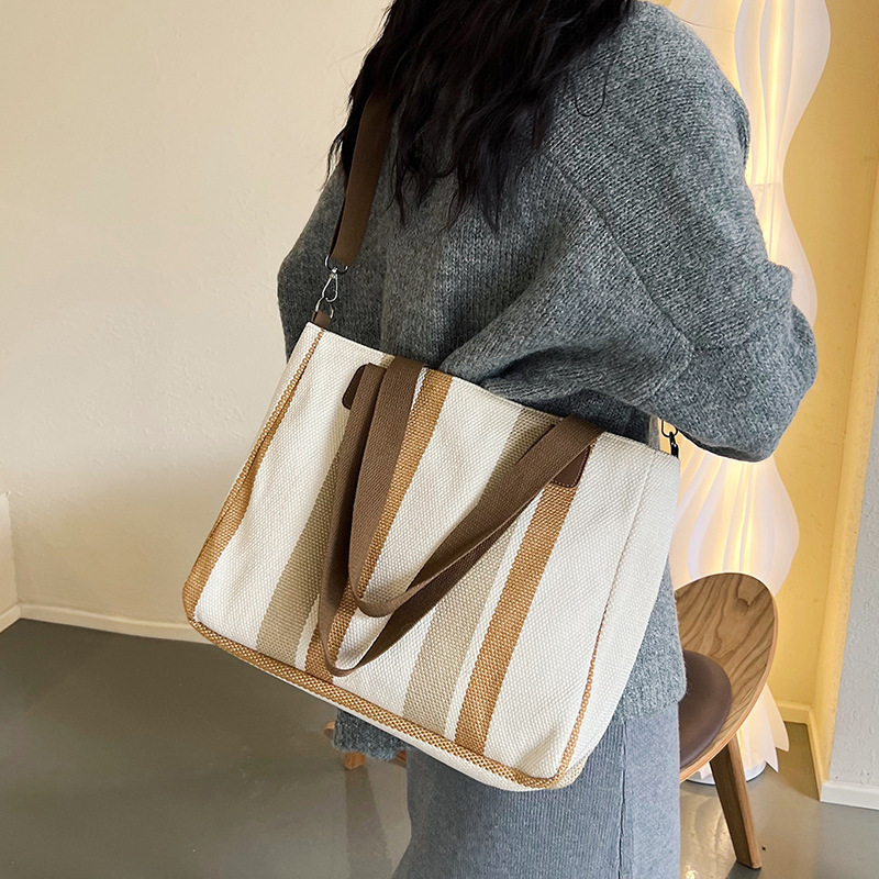 Bolso de lona bolso tote a rayas 2023 nuevo bolso de mujer bolso de mensajero de color dulce japonés de gran capacidad