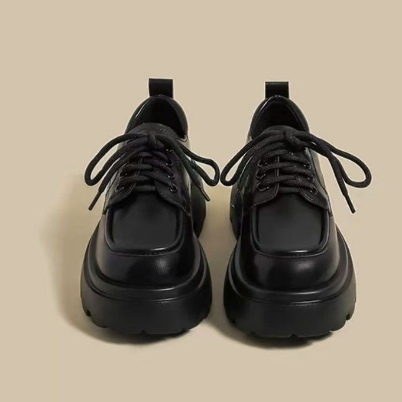 Zapatos de cuero de estilo británico para mujeres 2025 invierno nuevo tipo de cordón de suela gruesa muffin de suela suave retro versátil Lefour zapatos únicos