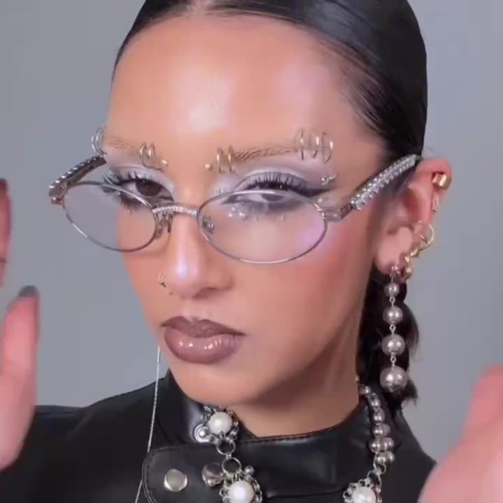 Nuevas gafas de sol ovaladas retro con diamantes de amor de alta gama europeas y americanas transfronterizas Jennie mismas gafas de sol para exteriores