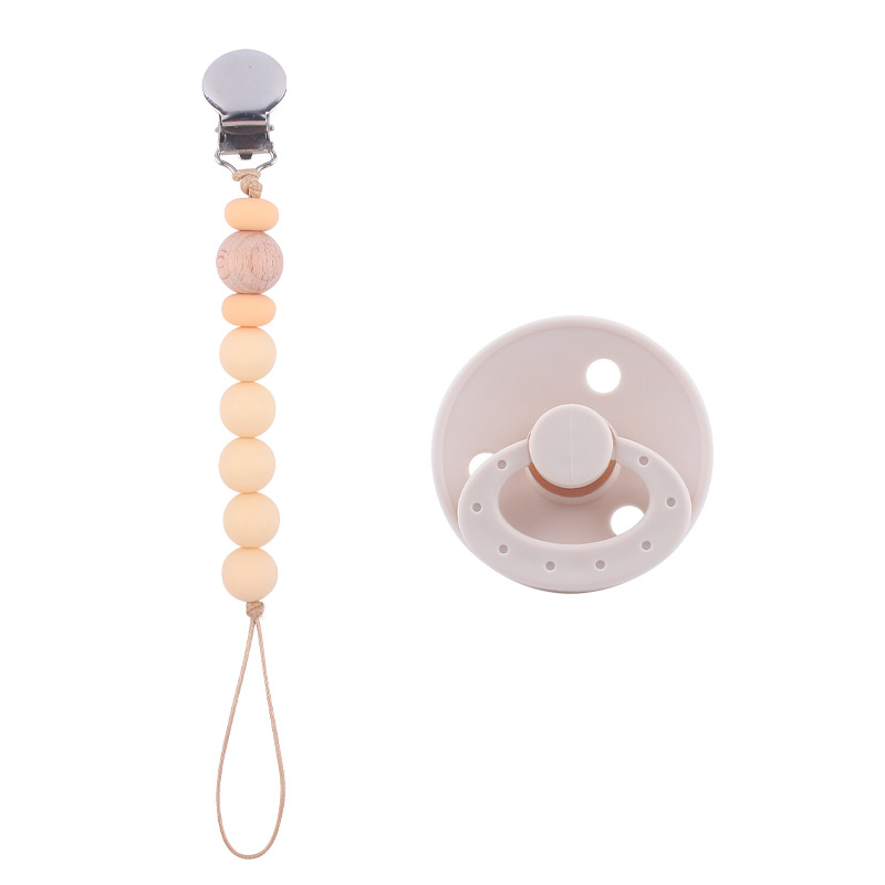 Nuevo bebé suministros chupete DIY creativo bebé silicona mordedura molar pezón cadena traje de dos piezas