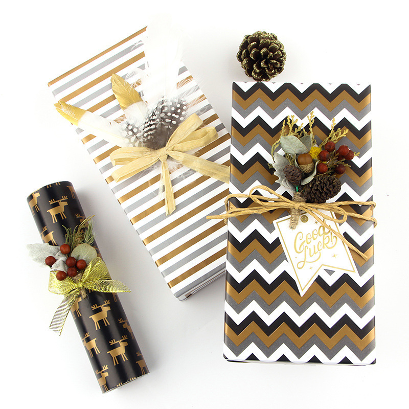 Amazon Oro Negro Navidad papel de regalo de cumpleaños del Día de San Valentín papel DIY hecho a mano bolsa cubierta de libro de papel al por mayor
