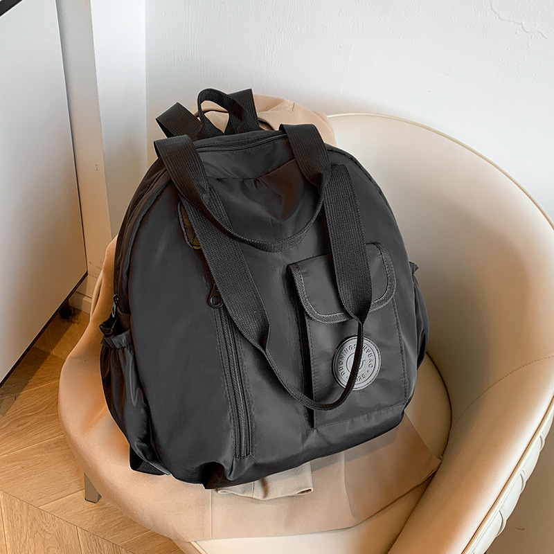 Otoño nuevo estilo de alta sensación compacto simple versátil gran capacidad viaje mochila de hombro bolsa multipropósito hombro