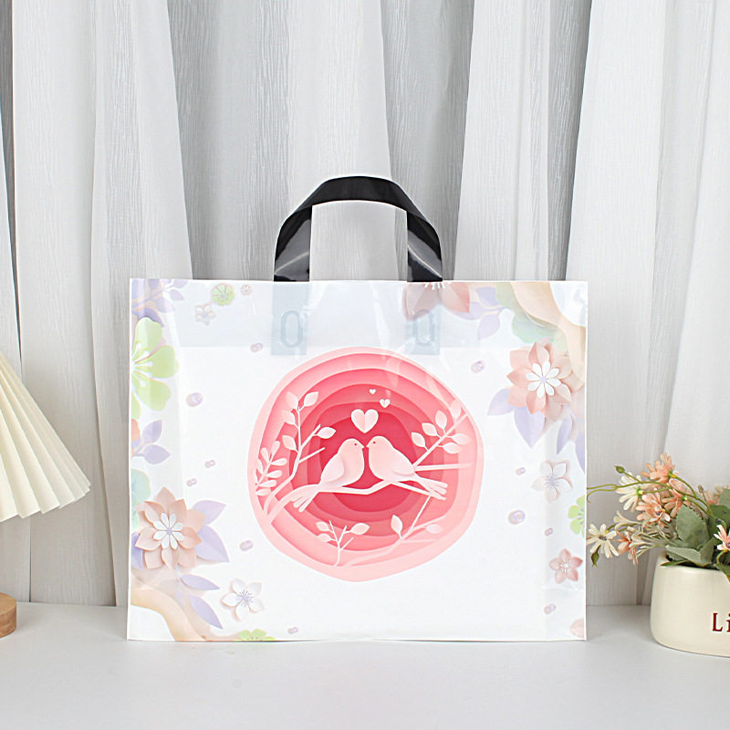 Tienda de ropa de suministro de fábrica bolso transparente logotipo impreso bolsa de embalaje de regalo bolsa de plástico de embalaje de ropa al por mayor