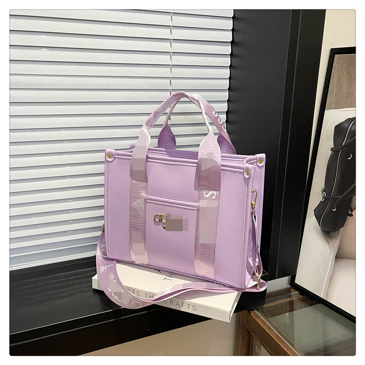 Bolso bandolera con letras de comercio exterior transfronterizo para mujer 2025 nueva tendencia de moda bolso de mensajero portátil impreso