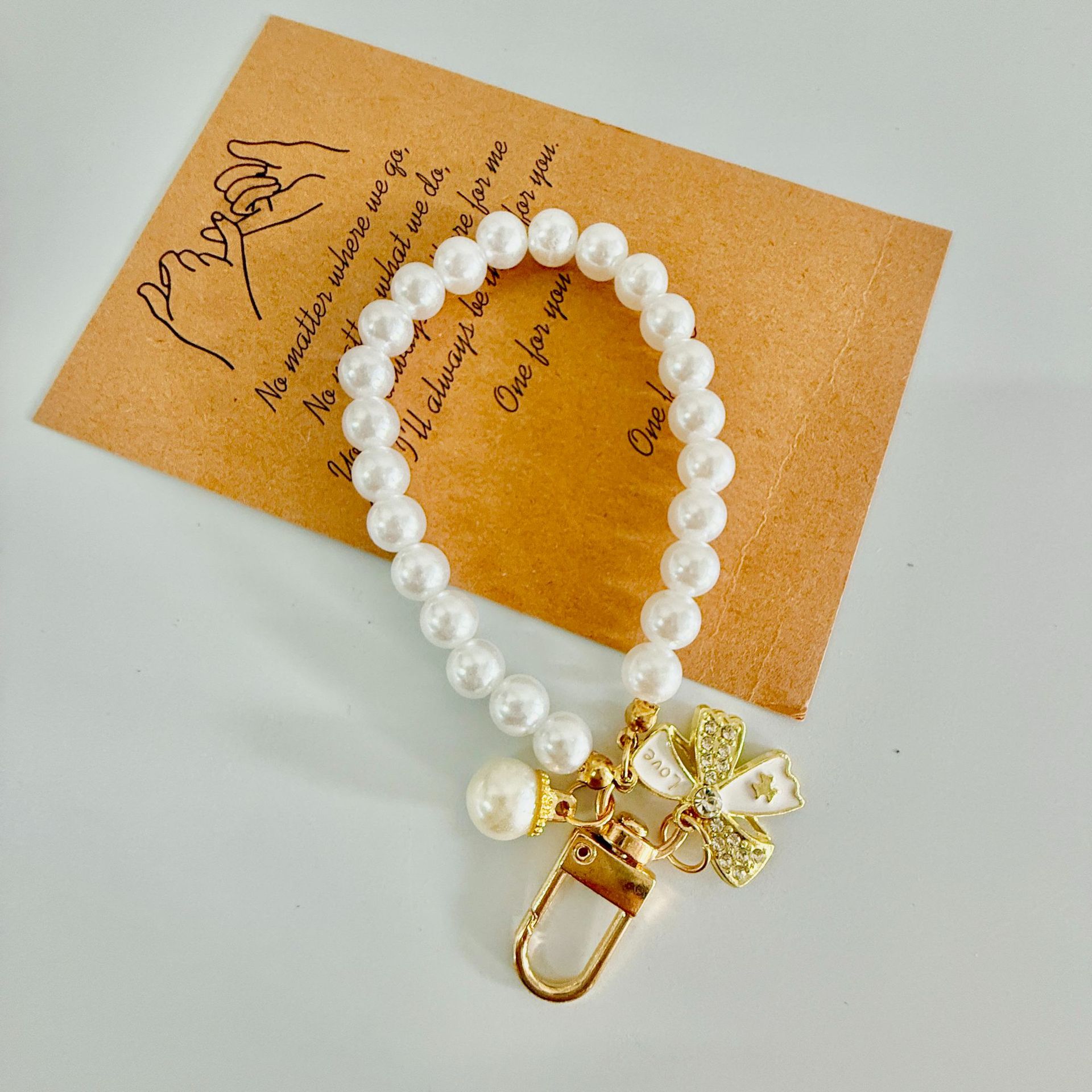 Nuevo amor creativo pulsera llavero colgante colgante accesorios de perlas joyas rojas en línea al por mayor