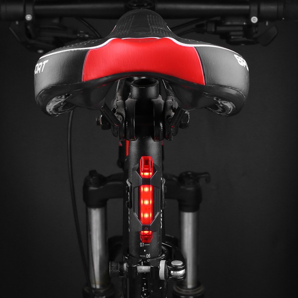 Bicicleta luz trasera equipo de conducción nocturna transfronteriza resaltado 5LED inteligente bicicleta de montaña roja USB carga luz delantera de advertencia
