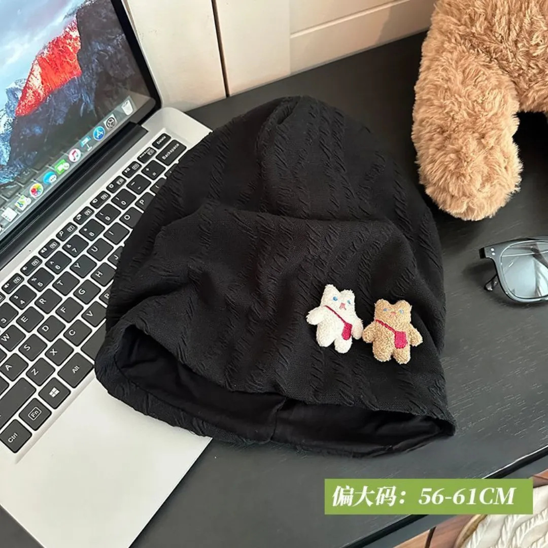 Black, with little bears