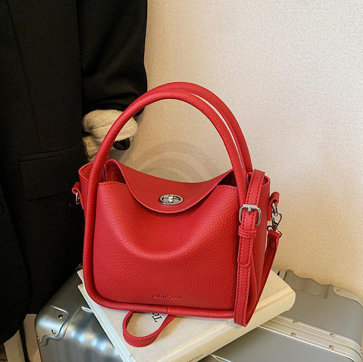 Bolso de cesta de verduras de estilo caliente de comercio exterior para mujer 2025 nuevo bolso de hombro casual simple bolso de cubo de aire occidental salvaje