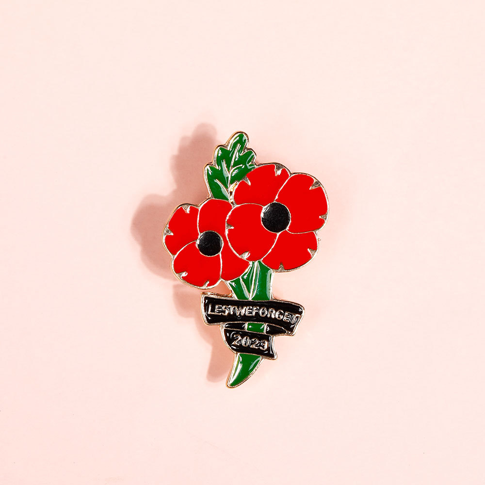 Europeo y americano nuevo aniversario flor roja broche princesa británica Kate conmemorativa rhinestone broche moda gota aceite diamante