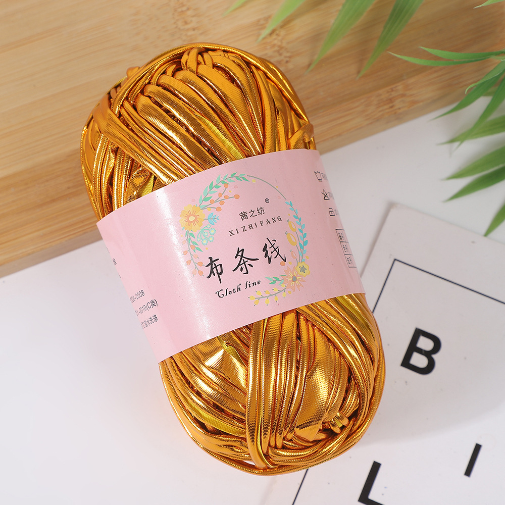 Línea textil Qian Zhi hilo de color mágico tejido a mano hilo de fantasía de color bricolaje en stock fábrica al por mayor