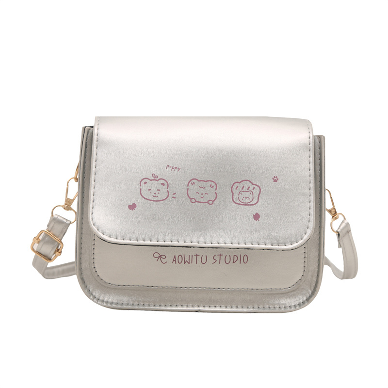 Bolso de mujer de color contrastante 2025 nuevo estilo de estilo de impresión de moda extranjera, bolso de hombro simple, bolso de mochila dulce