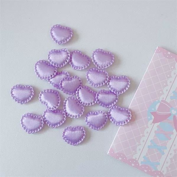 2 small purple satin hearts