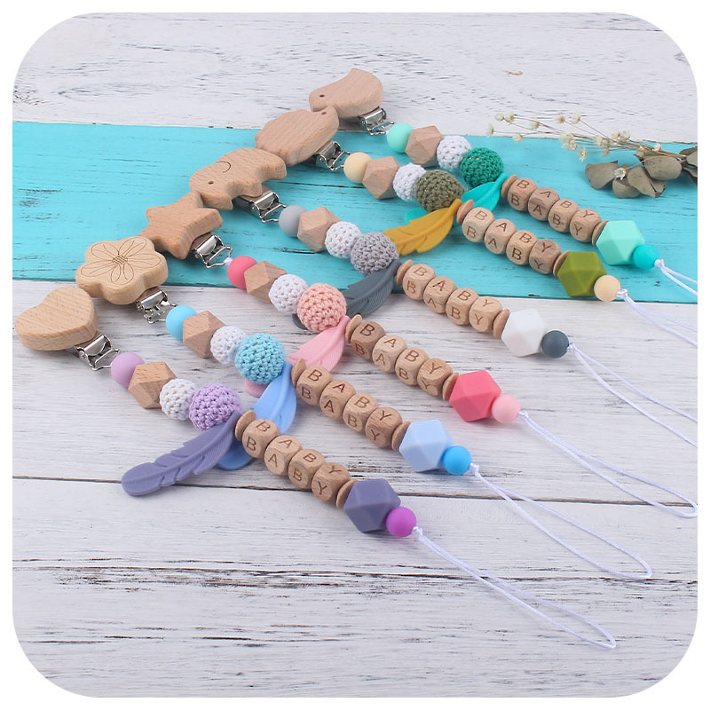 Nuevo DIY nombre del bebé calmante silicona pluma chupete anti-gota cadena bebé juguete haya animal chupete clip