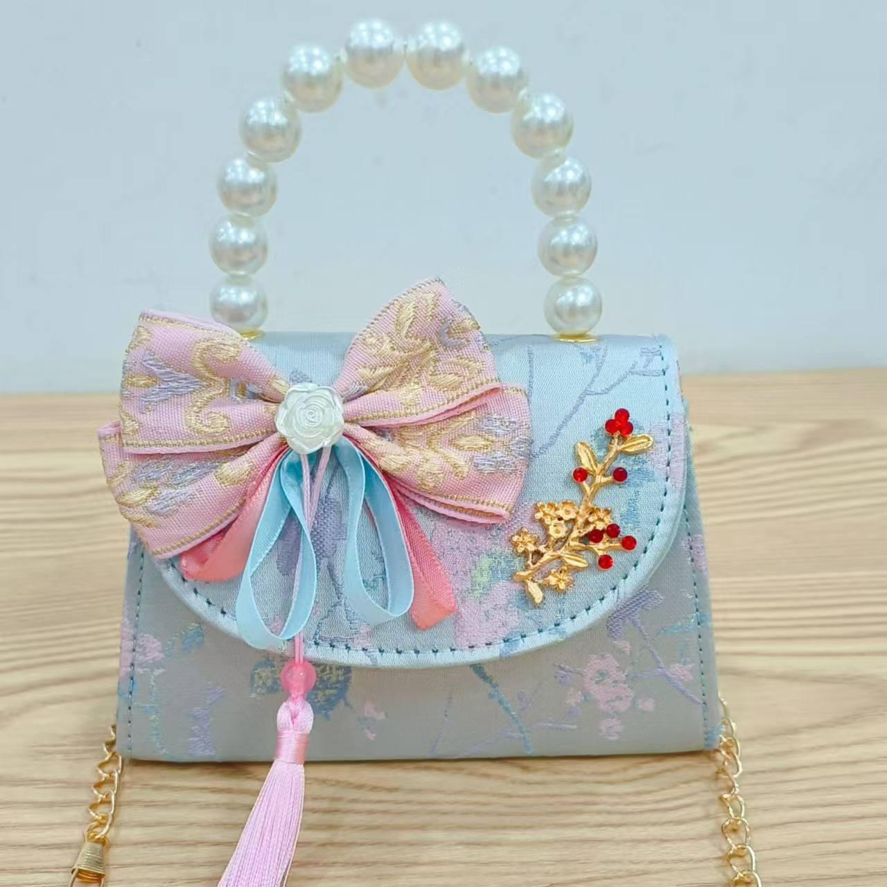 Niños pequeños bolsos de hombro de viento de fragancia de alta calidad exquisita niña antigua bolso de cambio princesa perla bolso de mano