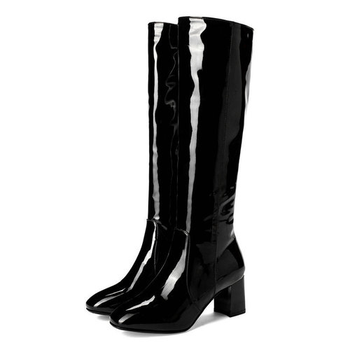 Stylish tall boot with thick sole, suitable for stage performance and nightclubs, featuring a slimming design and over-the-knee length.