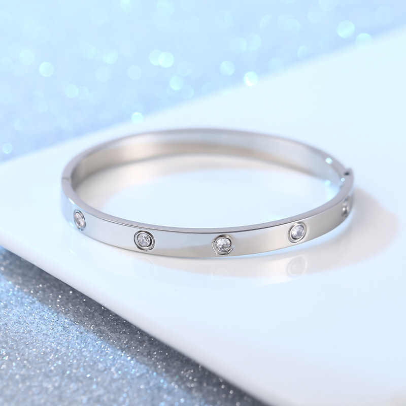 Pulsera de pareja de acero de titanio con 10 diamantes, diseño simple y elegante tipo cielo estrellado, venta al por mayor.