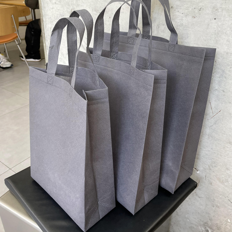Bolsa de tela no tejida vertical gris, bolsas de regalo para tiendas de ropa LOGO