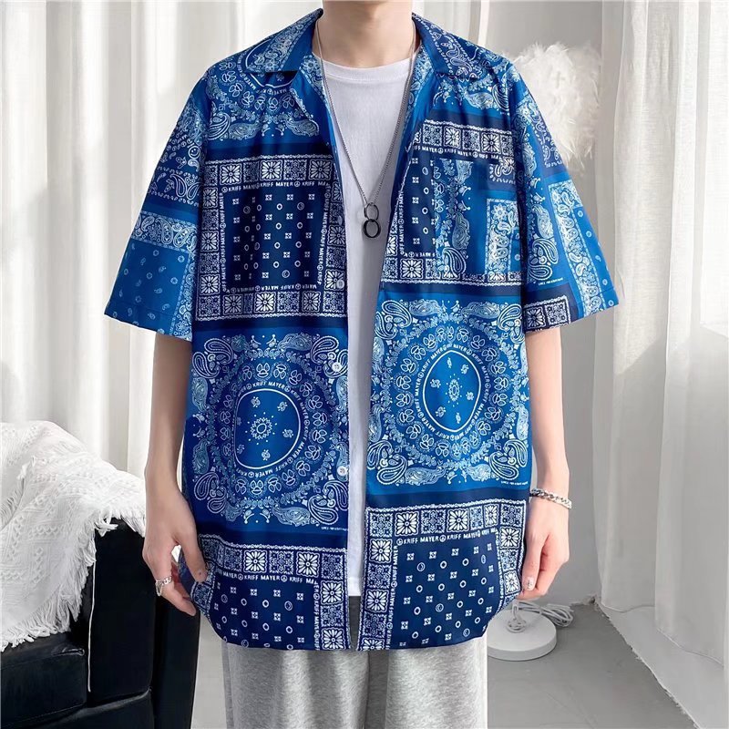 Hong Kong estilo Retro Vintage floral camisa de manga corta Estilo Hawaiano tailandés diseño sentido Ruan guapo camisa suelta para hombres y mujeres