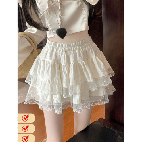 Sweet ballet-style lace-embellished ruffled tiered cake skirt—versatile summer pick for a flattering high-waisted, figure-flattering pleated mini dress.