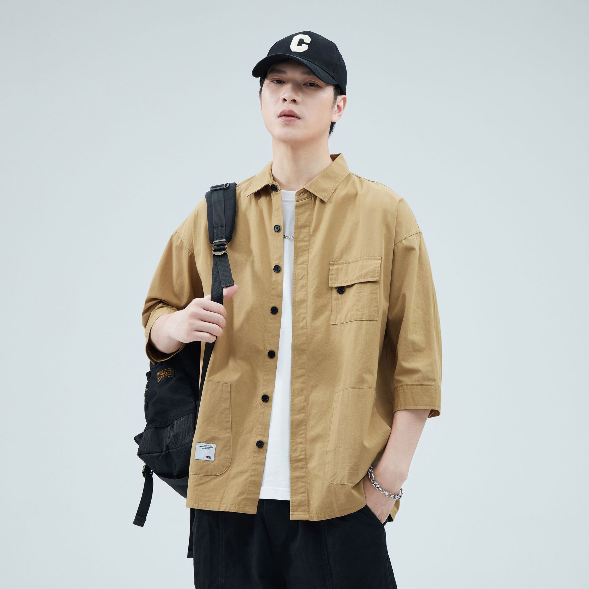 Camisa de trabajo holgada para hombre, primavera y verano, totalmente de algodón, estilo coreano, estilo americano informal, mangas tres cuartos, cuello único, bolsillo, transpirable y que absorbe la humedad.