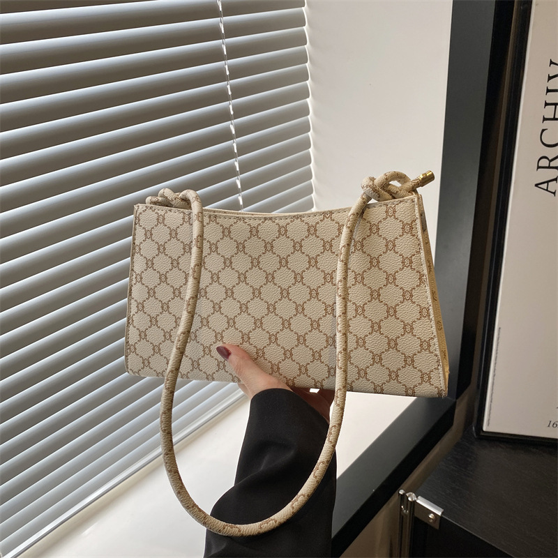 Bolsos bolsos de mujer 2025 primavera y verano nuevo estilo simple bolso de palo francés de cercanías impreso axila hombro pequeño mensajero pequeño bolso cuadrado
