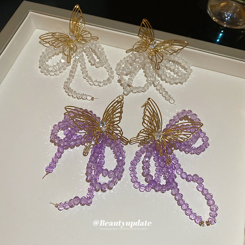 Pendientes de borla de cristal de mariposa de circón de aguja de plata Pendientes de lujo ligero de moda francesa Pendientes de temperamento femenino Sensación de clase alta de nicho