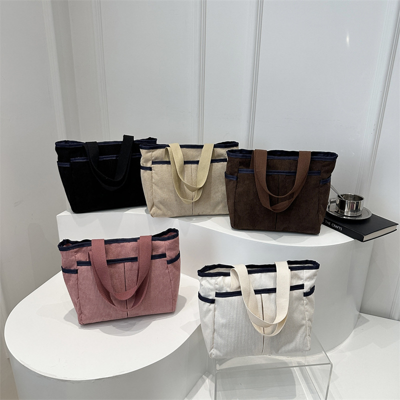 Bolsa de lona para mujeres 2024 nuevo invierno bolso de viaje de clase simple de gran capacidad bolsa de mano bolsa de hombro ocio