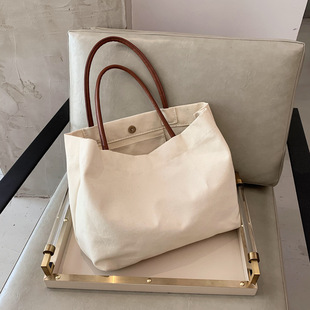 Capacious brand one-shoulder bag, shopping bag, school bag, shoulder bag, Korean style, simple and elegant design