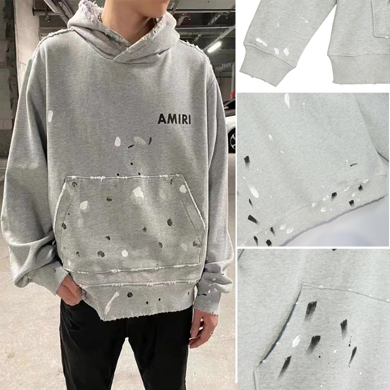Sudadera con capucha AMIRI europea y americana Wang Yibo mismo estilo pintado a mano Impresión de salpicaduras de tinta desgastada suéter con capucha para hombres y mujeres deshilachados