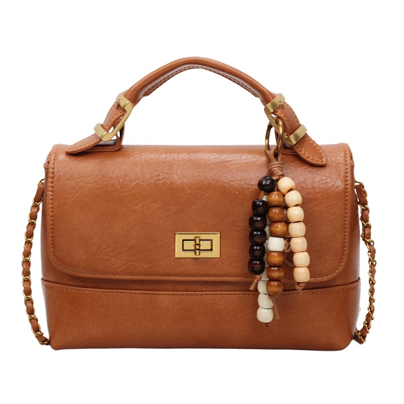 Cross-border 2025 otoño y invierno nuevo bolso de mano de alta calidad bolso cuadrado pequeño de textura de mujer bolso de hombro nicho bolso de mochila