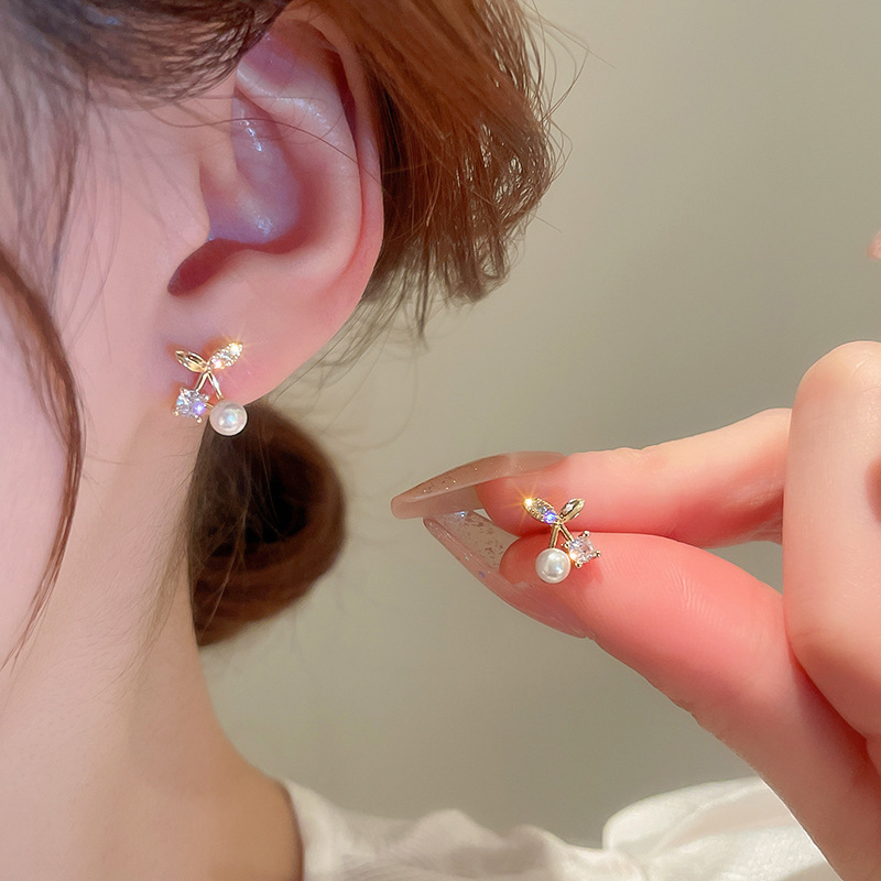 Pendientes de perlas de flor de circón de aguja de plata, pendientes de lujo de alta gama de lujo ligero exquisito, pendientes de todo fósforo blanco de moda de nicho al por mayor