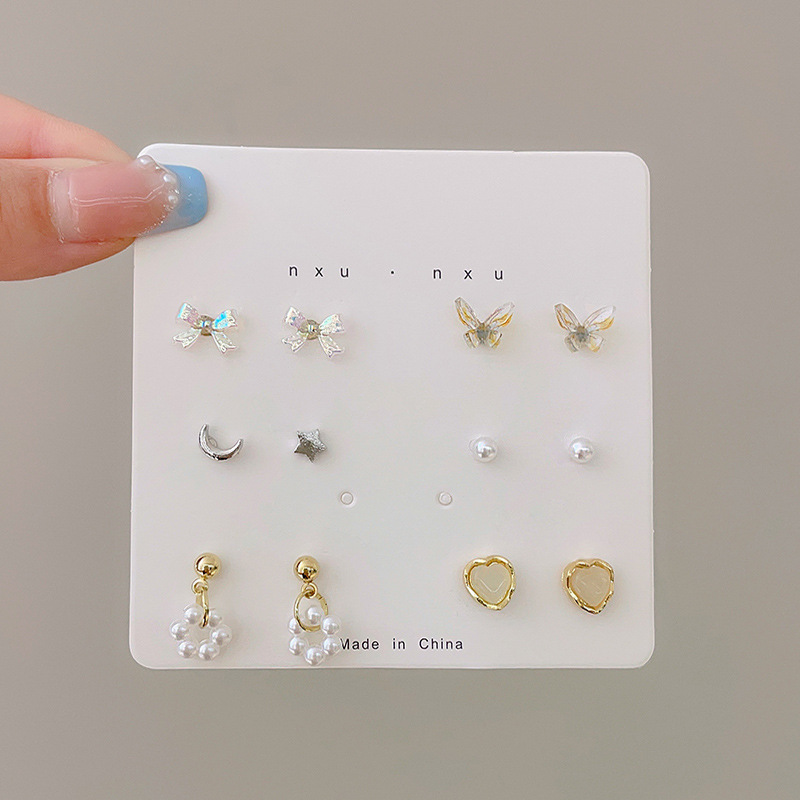 Aretes de aleación coreana de perlas de alto nivel de perlas largas al por mayor transfronterizas pendentes de cabina ligeros de lujo exagerados perfumes de orejas mujeres