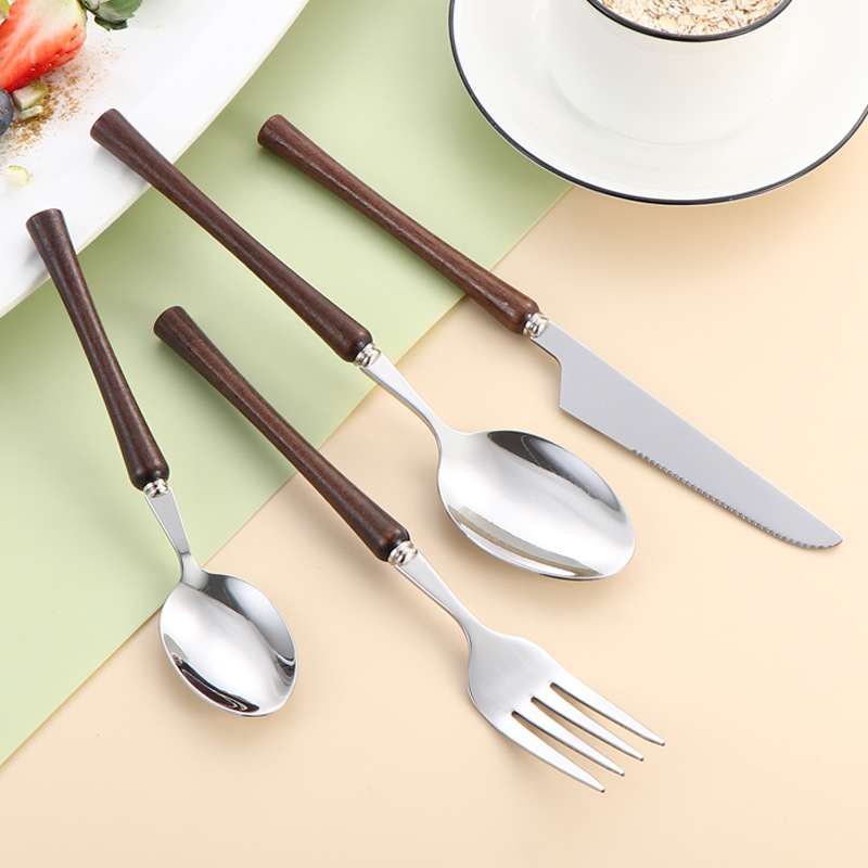Cross-border 304 mango de madera de acero inoxidable cintura pequeña brillante alas de pollo cuchillo de madera tenedor cuchara de cubierta occidental cuchillo de filete conjunto de cuatro piezas