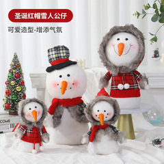 国境を越えたクリスマス装飾品雪だるま人形暖かい家庭ベルベットデパートのショーウインドーに雪だるまの置物を配置する