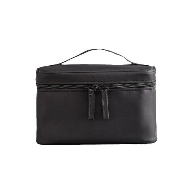 Capacious handheld cosmetic bag