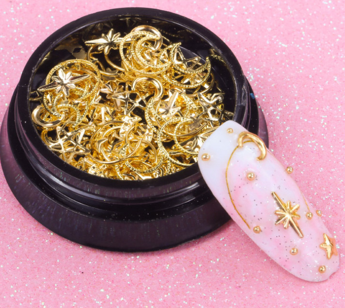 Joyas de belleza de uñas de la estrella y la luna, remaches de estampado de oro, bolas de acero mezcladas con anillo de metal, diamante de agua, diafragma de aleación hueca japonesa