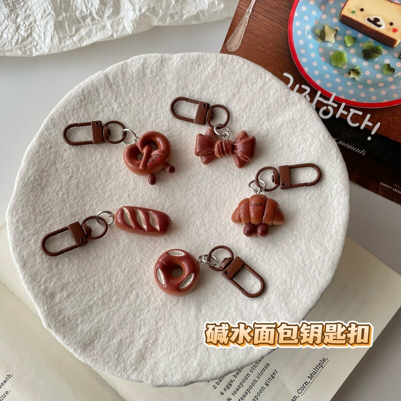 Cute Realistic Smiling Face Alkaline Bread Keychain Cartoon Food Toy Pendant Student Best Friend Gift Bag Accessory
