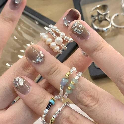 Xiaohongshu blogger's same accessory ring niche design high-end elastic rope broken silver ring for women simple style
