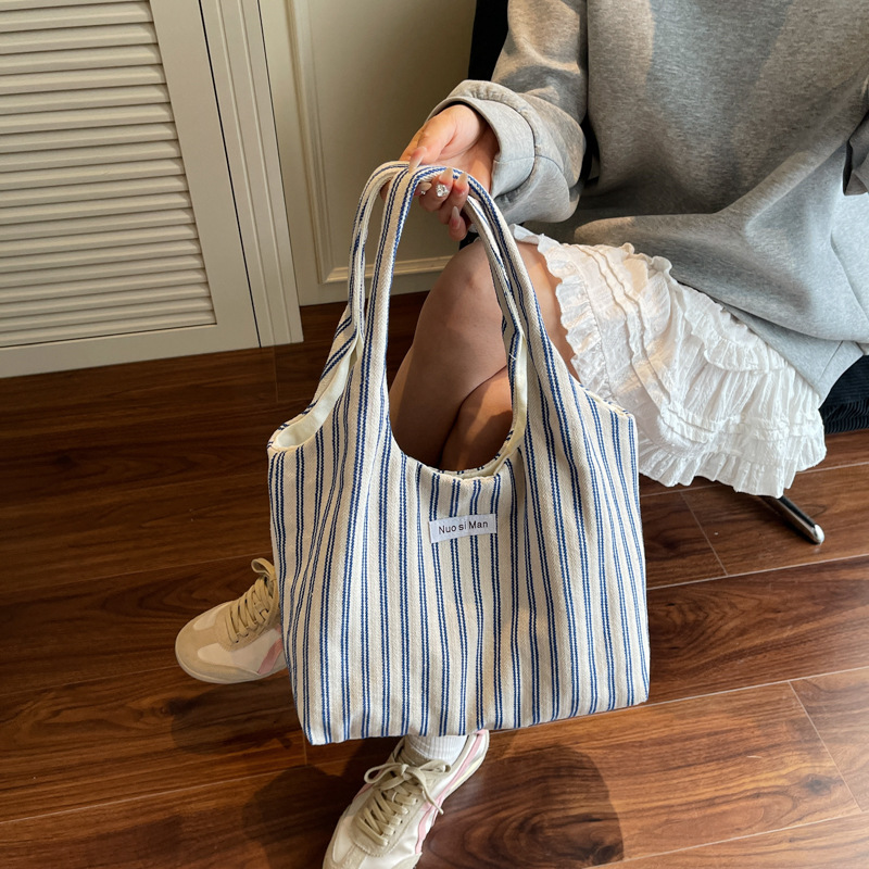 Bolso Tote de moda coreana 2025 nuevo bolso de lona estilo azul marino a rayas bolso de hombro con letras casuales