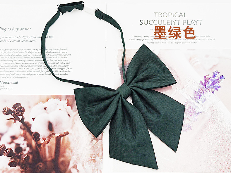 Fábrica directa mate pluma raíz pajarita hembra más tamaño pluma roja raíz coreana Colegio estilo sólido color JK pajarita collar flor