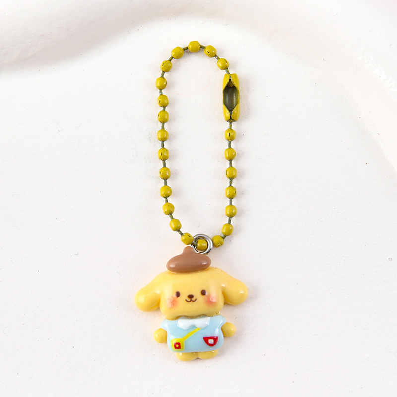 新しいかわいいアニメのキーホルダーは学生のキーホルダーに飾られています。|undefined